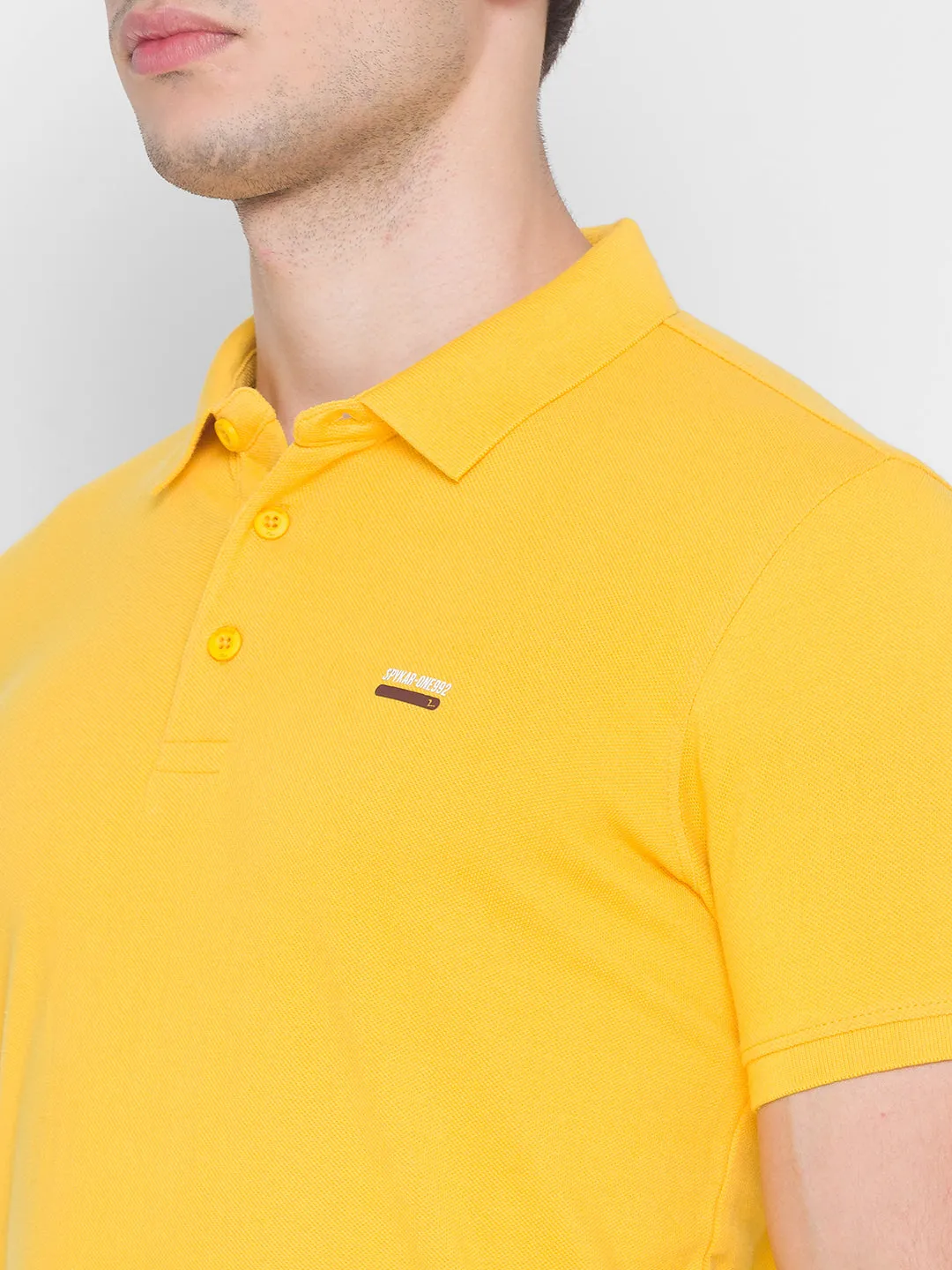 Spykar Men Yellow Cotton Slim Fit Round Neck Polo T-Shirt